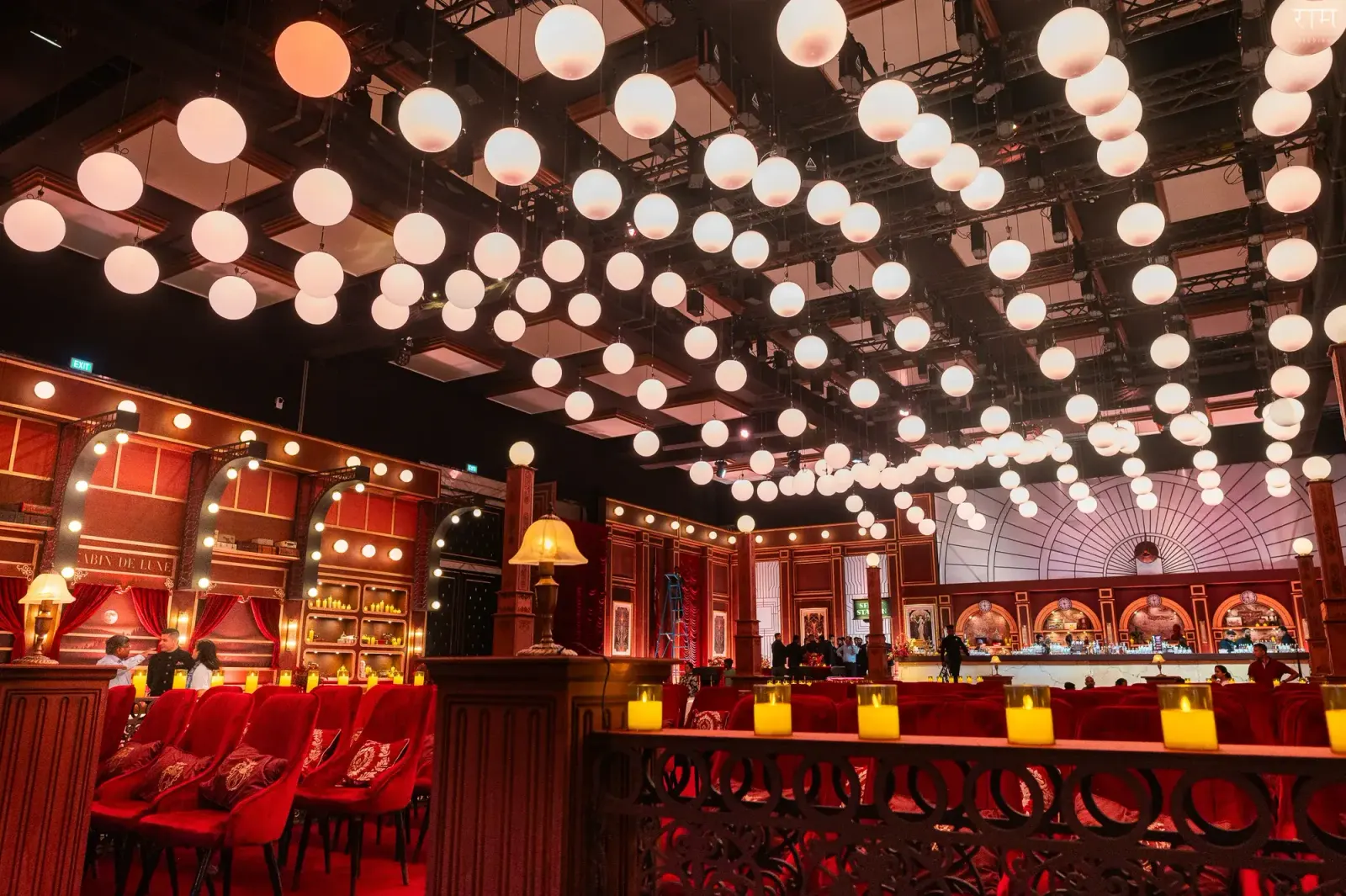 Globe-lit banquet hall set for a DreamzKrraft wedding celebration