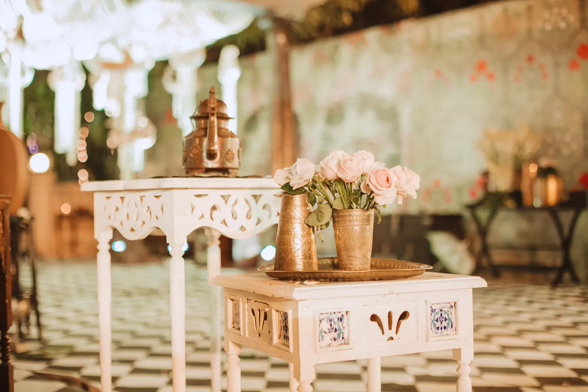 A sculpted white tiger set piece against chevron décor, built inside The Wedding Atelier